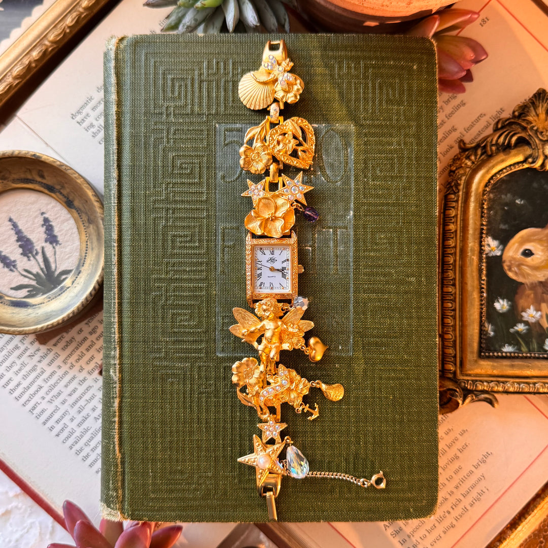 Extremely Rare Kirks Folly Cherub Charm Watch