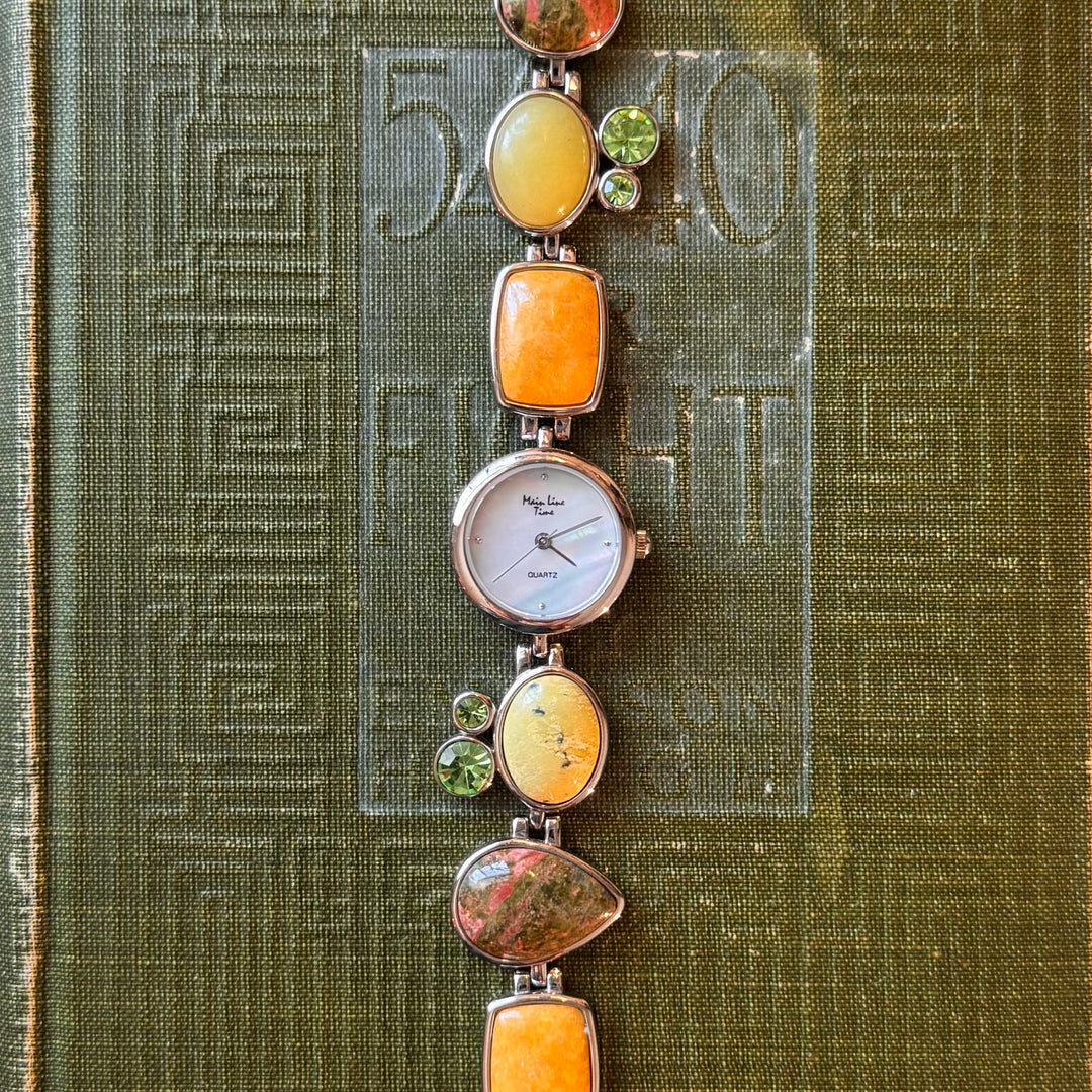 Gold Watch with Multicolored Stones