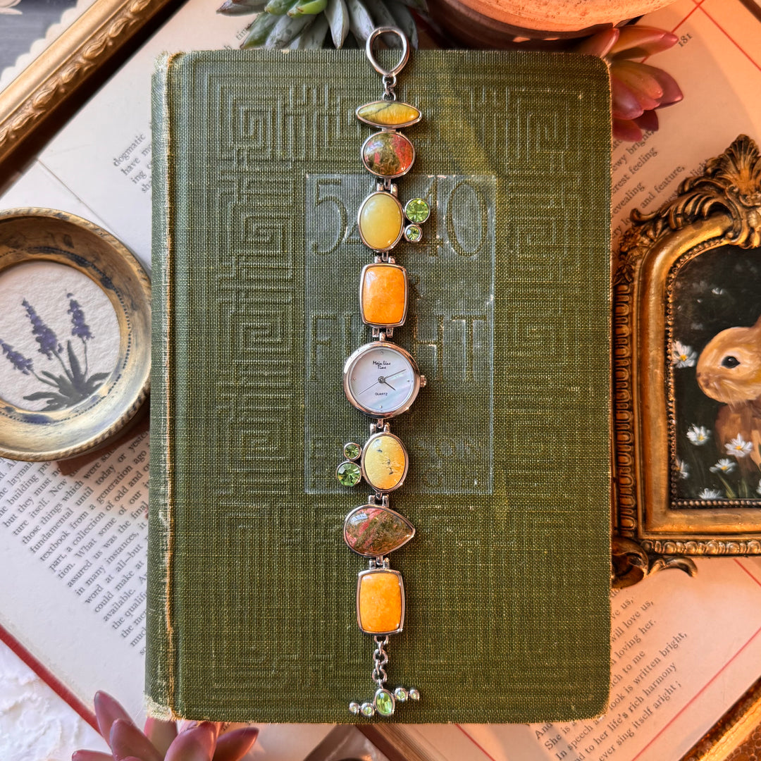 Gold Watch with Multicolored Stones