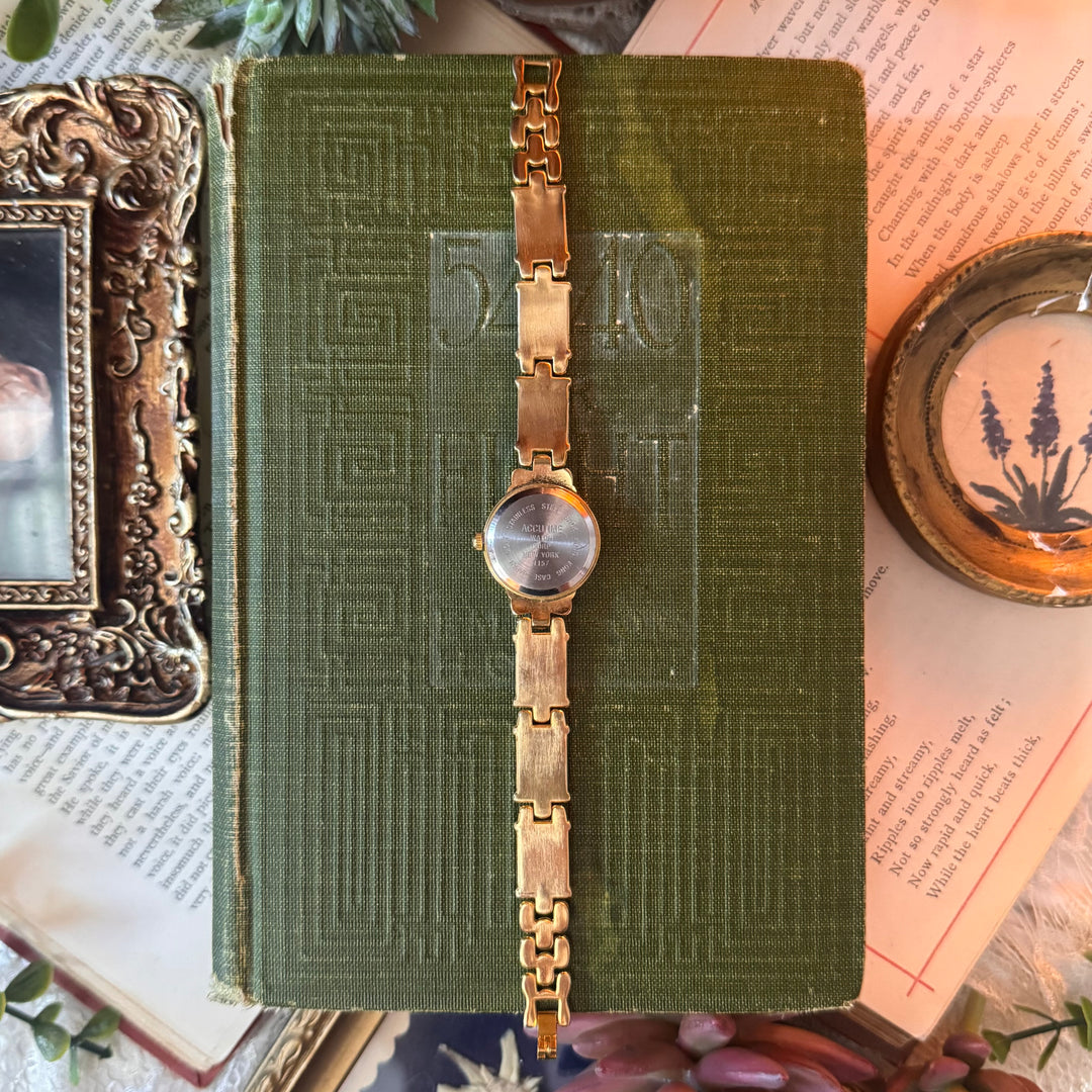 Gold Watch with Green Accents