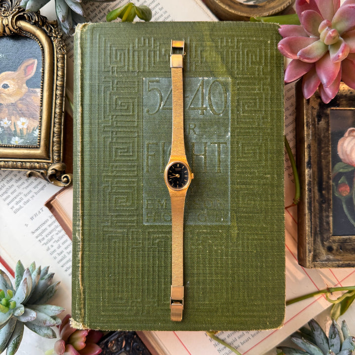 Gold Watch with Black Face