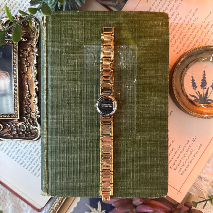 Gold Watch with Black Face