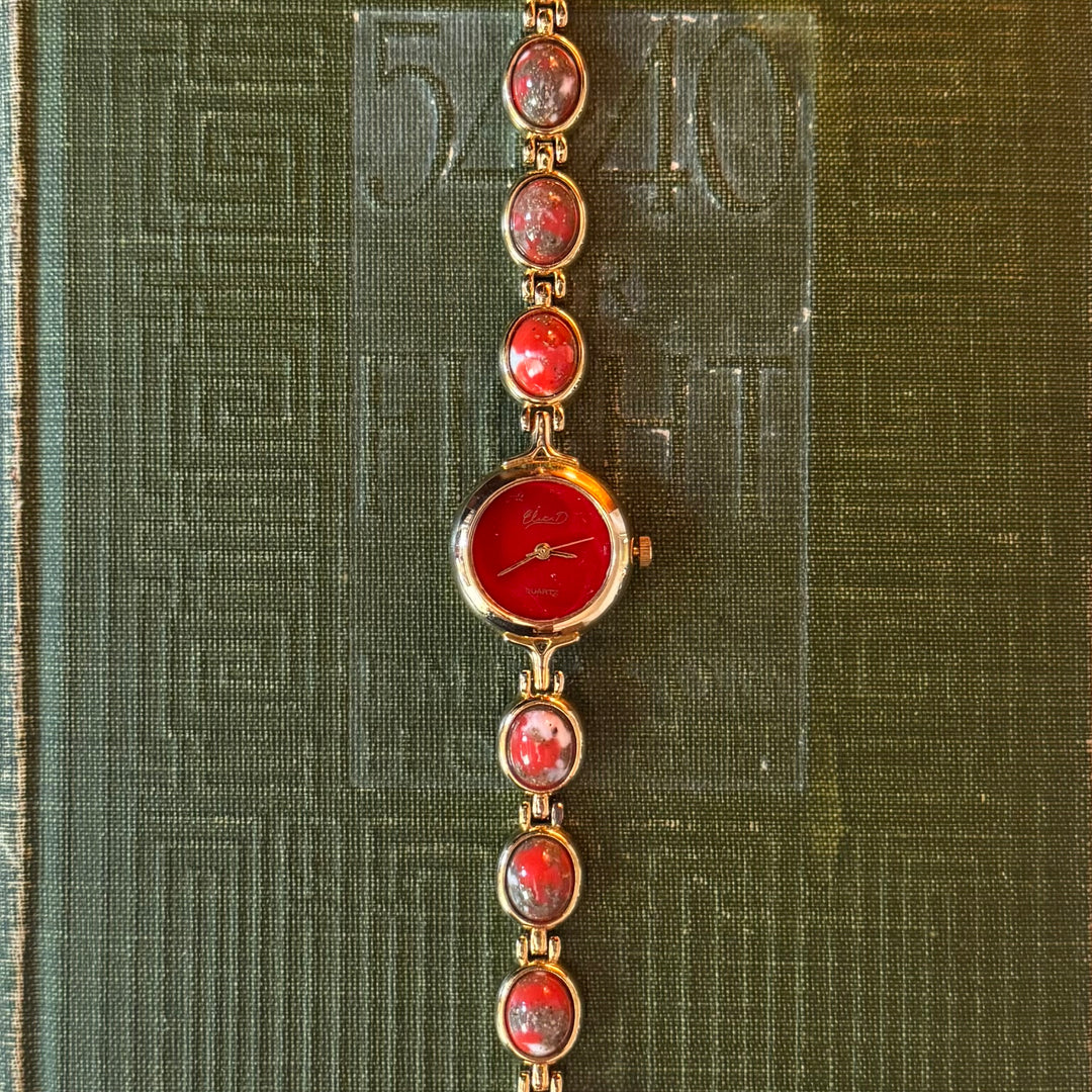 Gold Watch with Red Accents