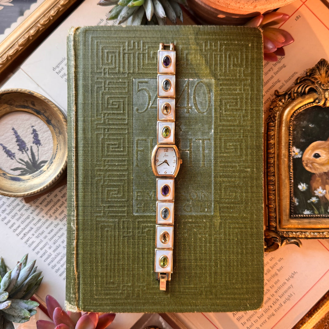 Gold Watch with Multicolored Stones