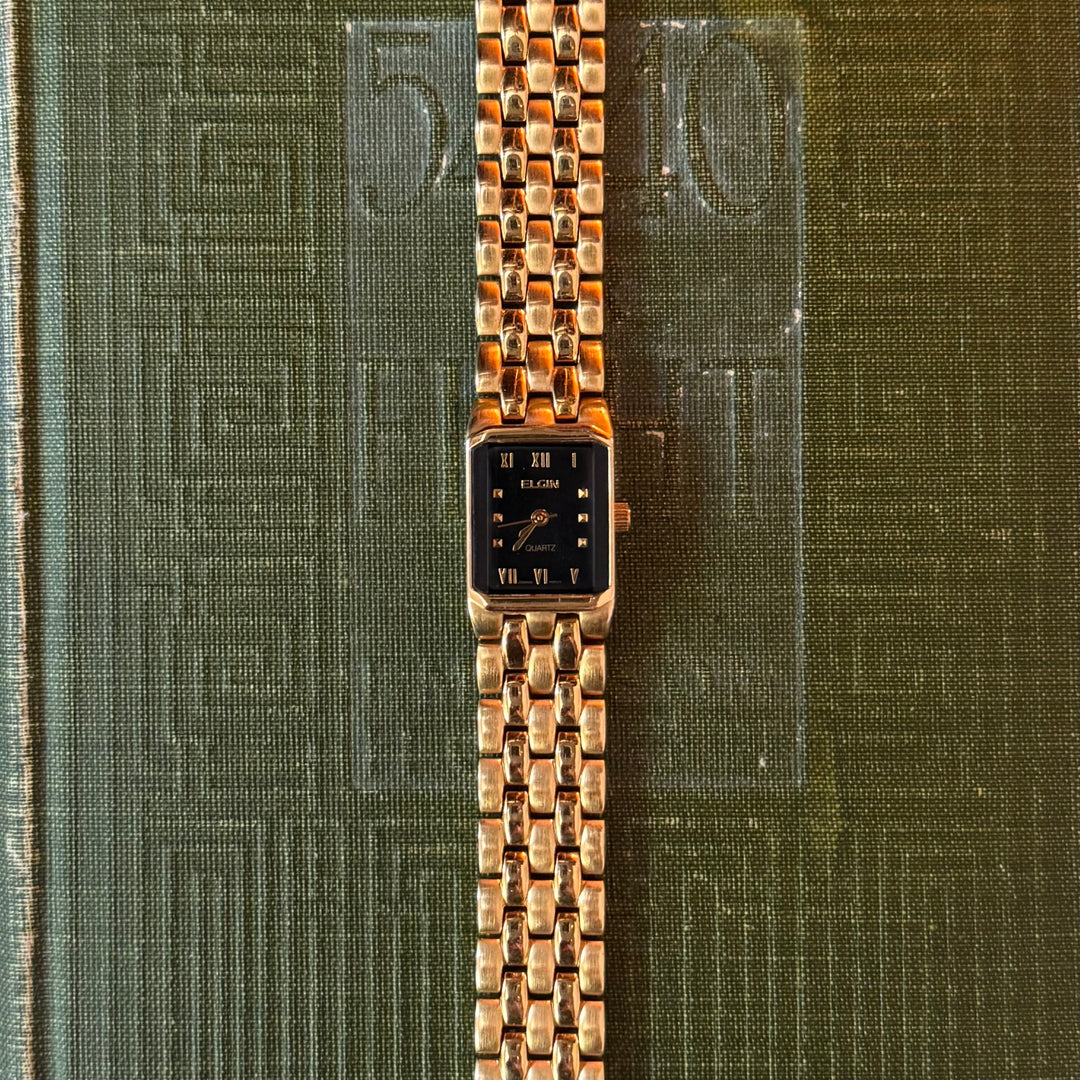 Gold Watch with Black Face