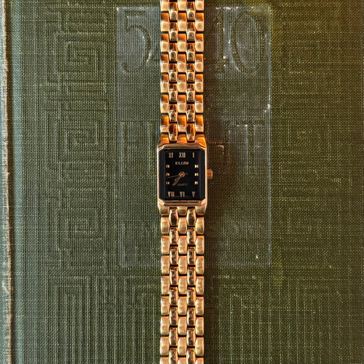 Gold Watch with Black Face