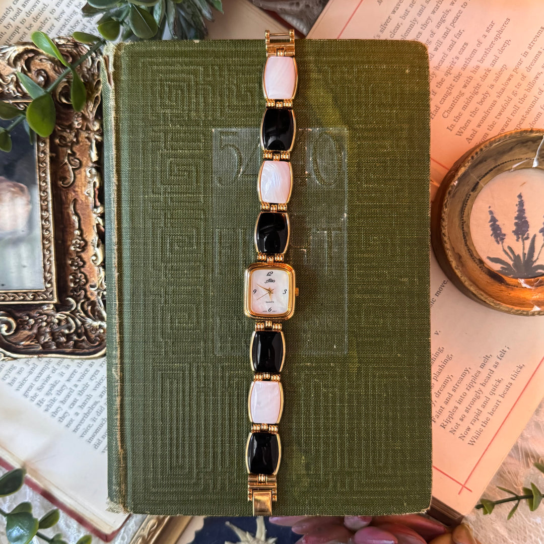 Gold Watch with Black and White Band