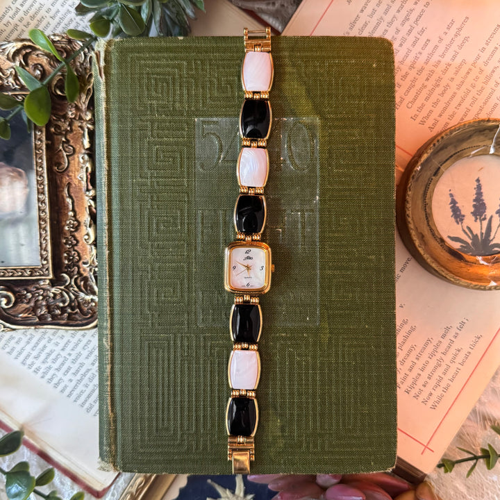 Gold Watch with Black and White Band