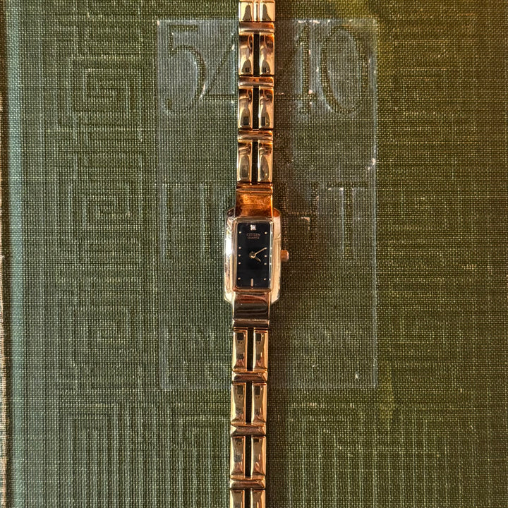 Gold Watch with Black Face