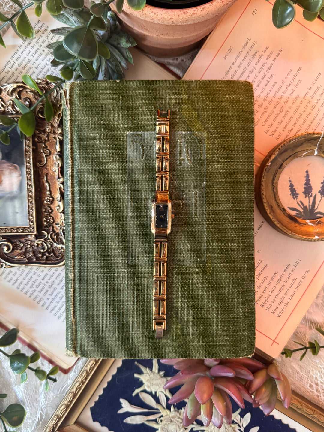 Gold Watch with Black Face