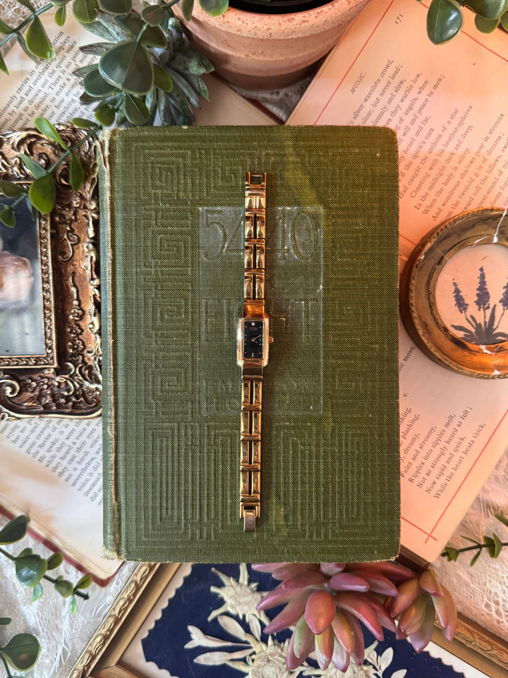 Gold Watch with Black Face