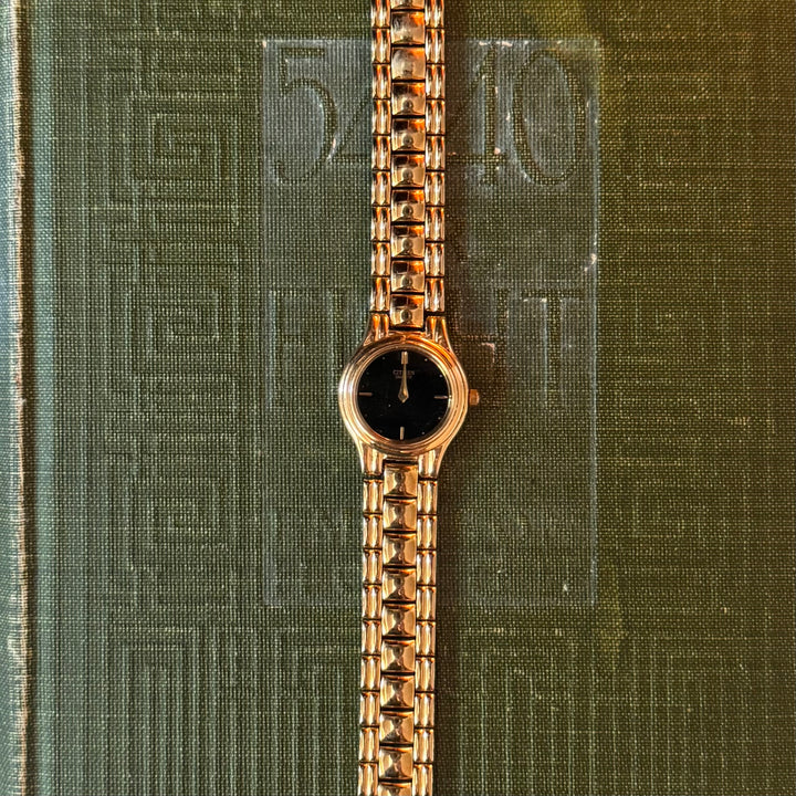 Gold Watch with Black Face