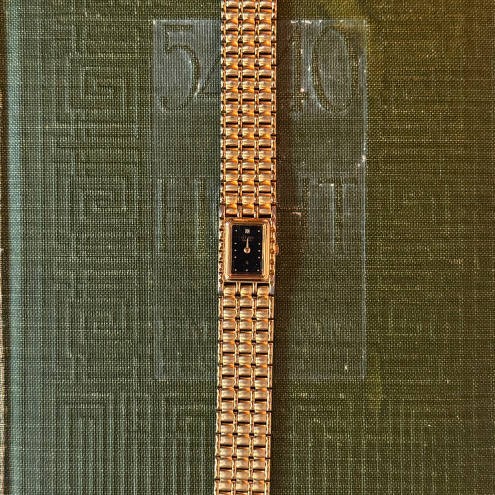 Gold Watch with Black Face