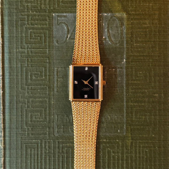 Gold Watch with Black Face