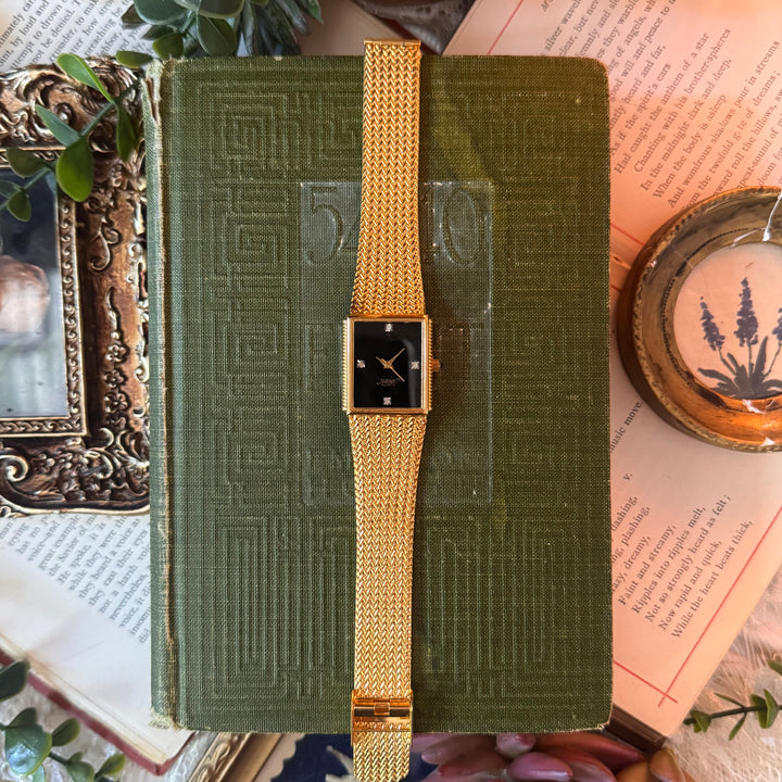 Gold Watch with Black Face