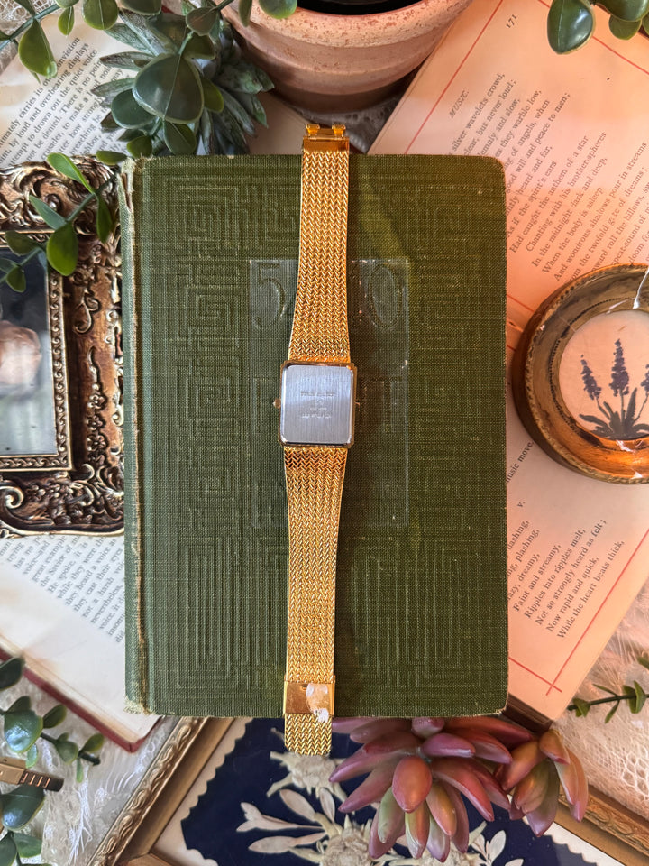 Gold Watch with Black Face