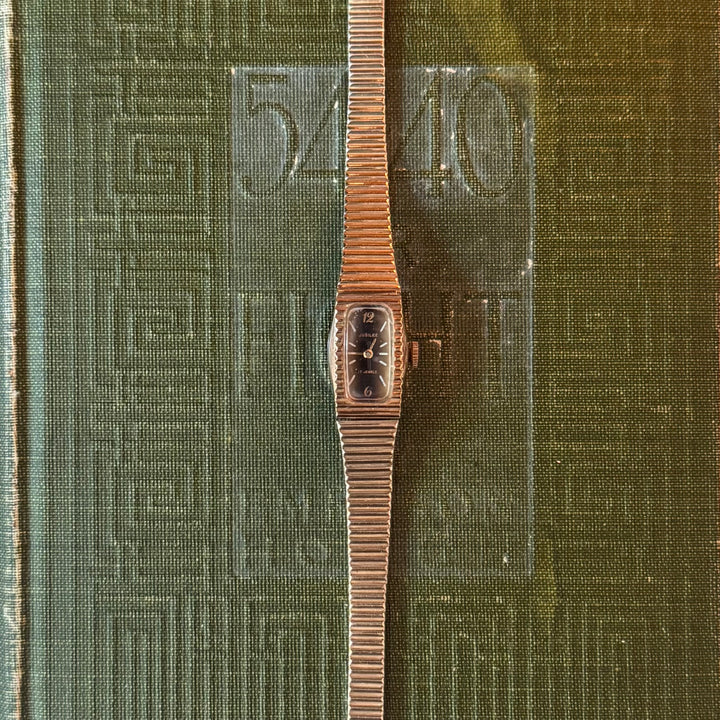 Gold Watch with Black Face