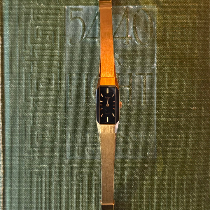 Gold Watch with Black Face