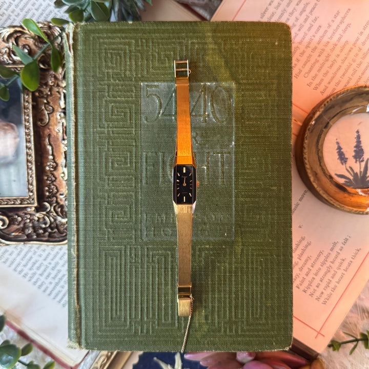 Gold Watch with Black Face