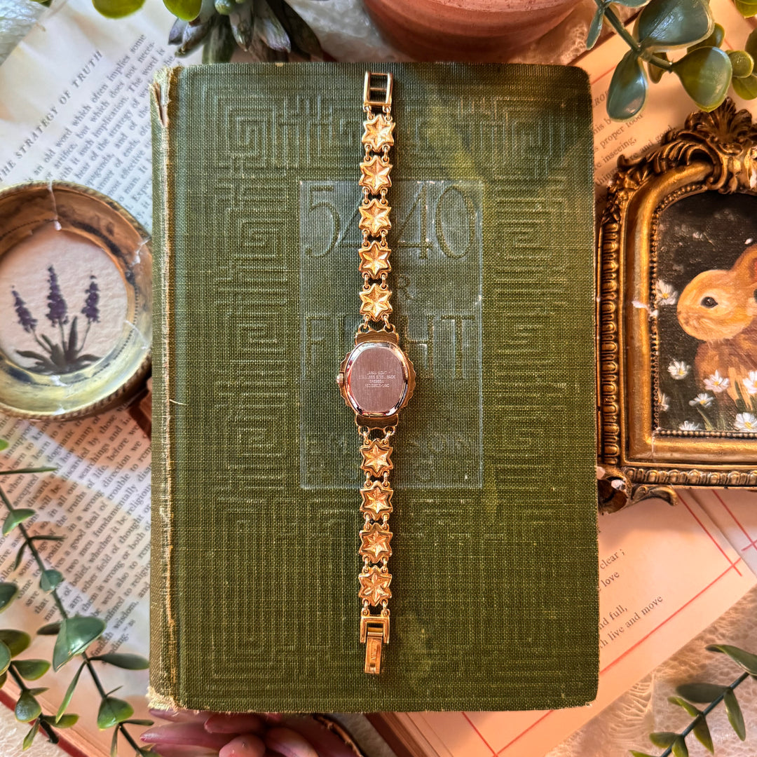 Gold Floral Watch with Red Rhinestones