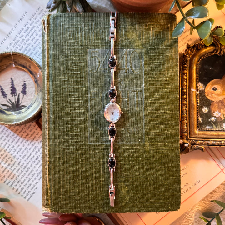 Silver Watch with Black Stones