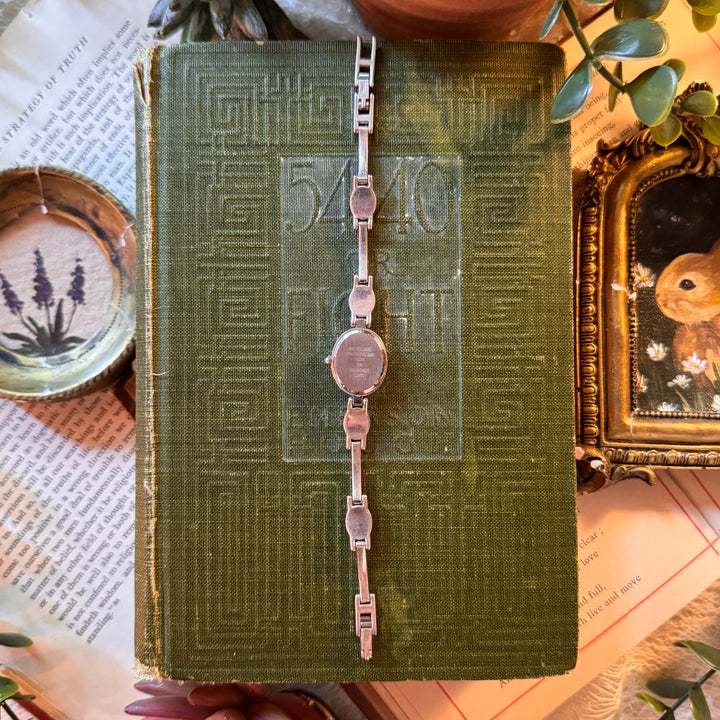 Silver Watch with Black Stones