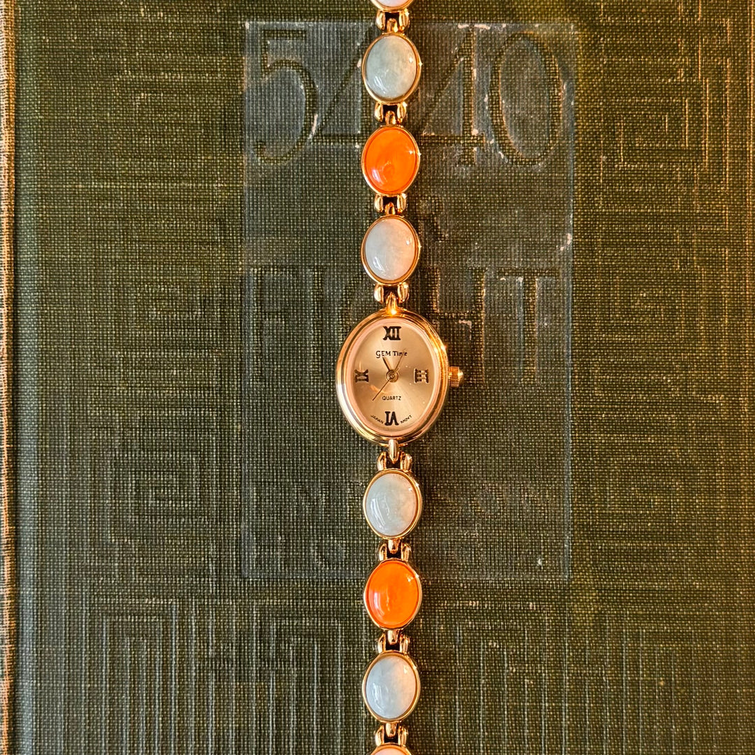 Gold Watch with Cabochon Stones