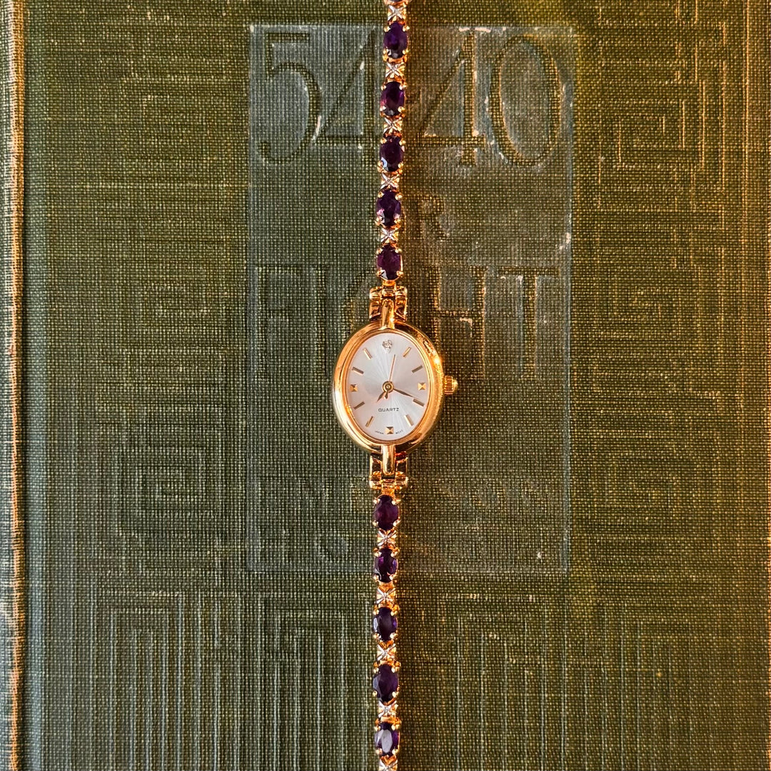 Gold Watch with Purple Stones