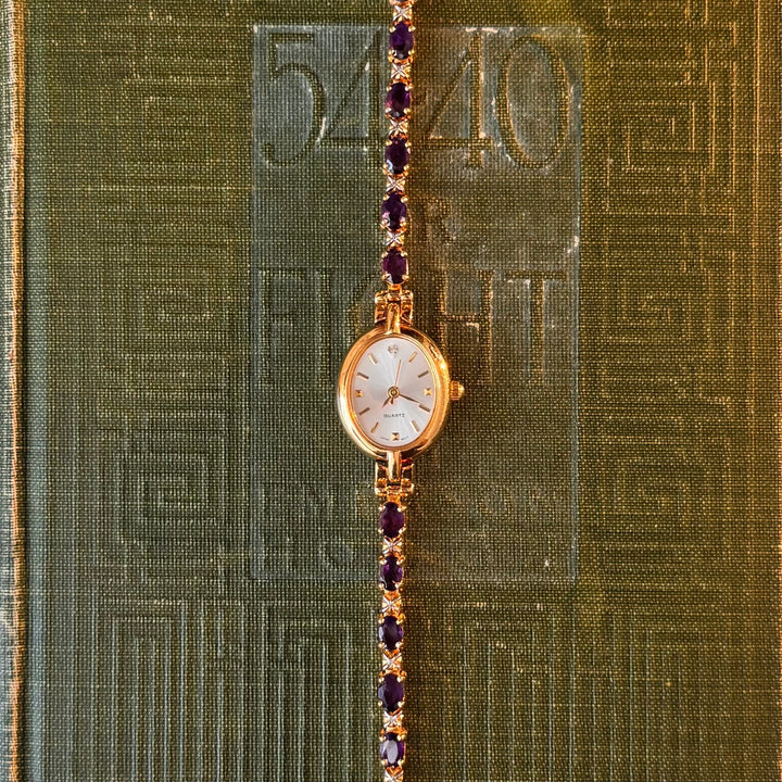 Gold Watch with Purple Stones