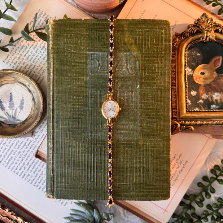 Gold Watch with Purple Stones