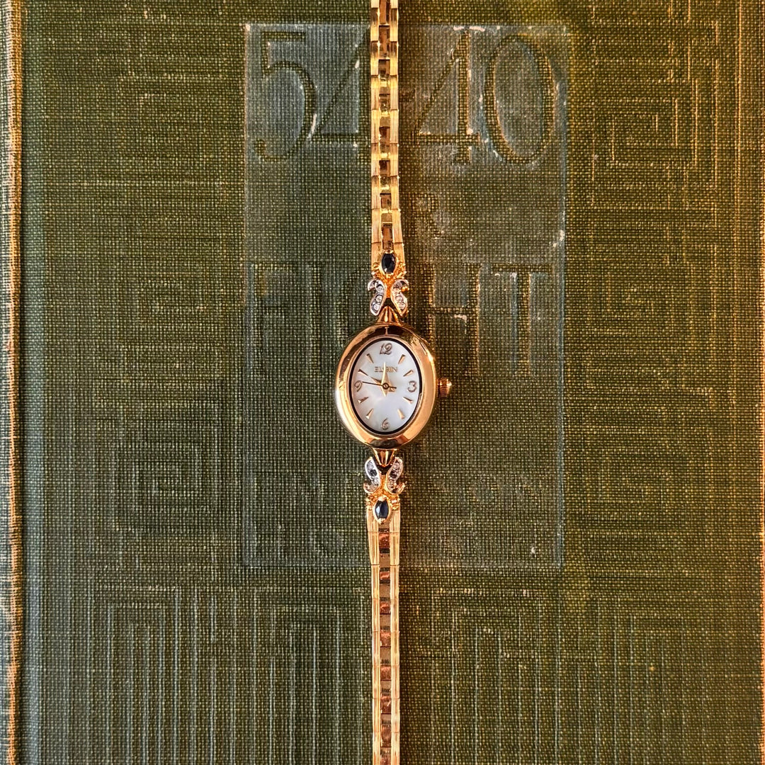 Gold Watch with Sapphire Stones