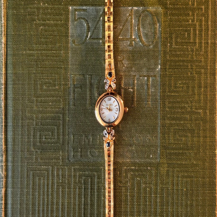 Gold Watch with Sapphire Stones