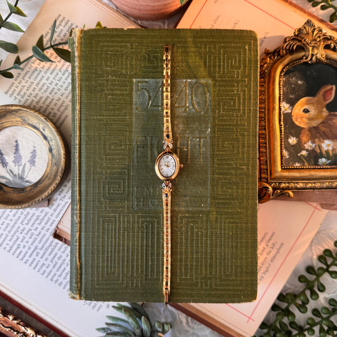 Gold Watch with Sapphire Stones