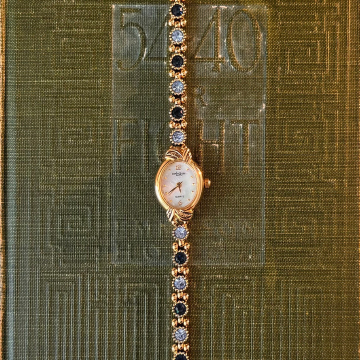 Gold Watch with Blue Stones