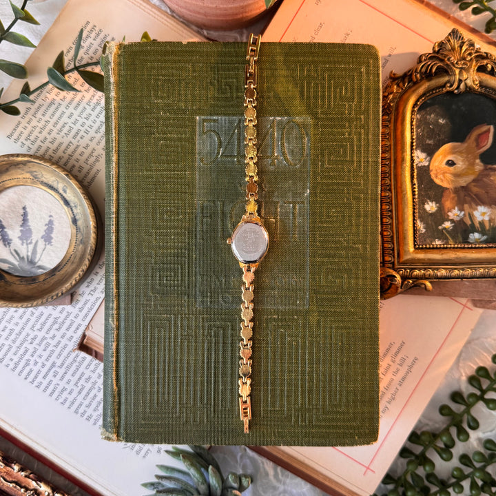 Gold Watch with Blue Stones