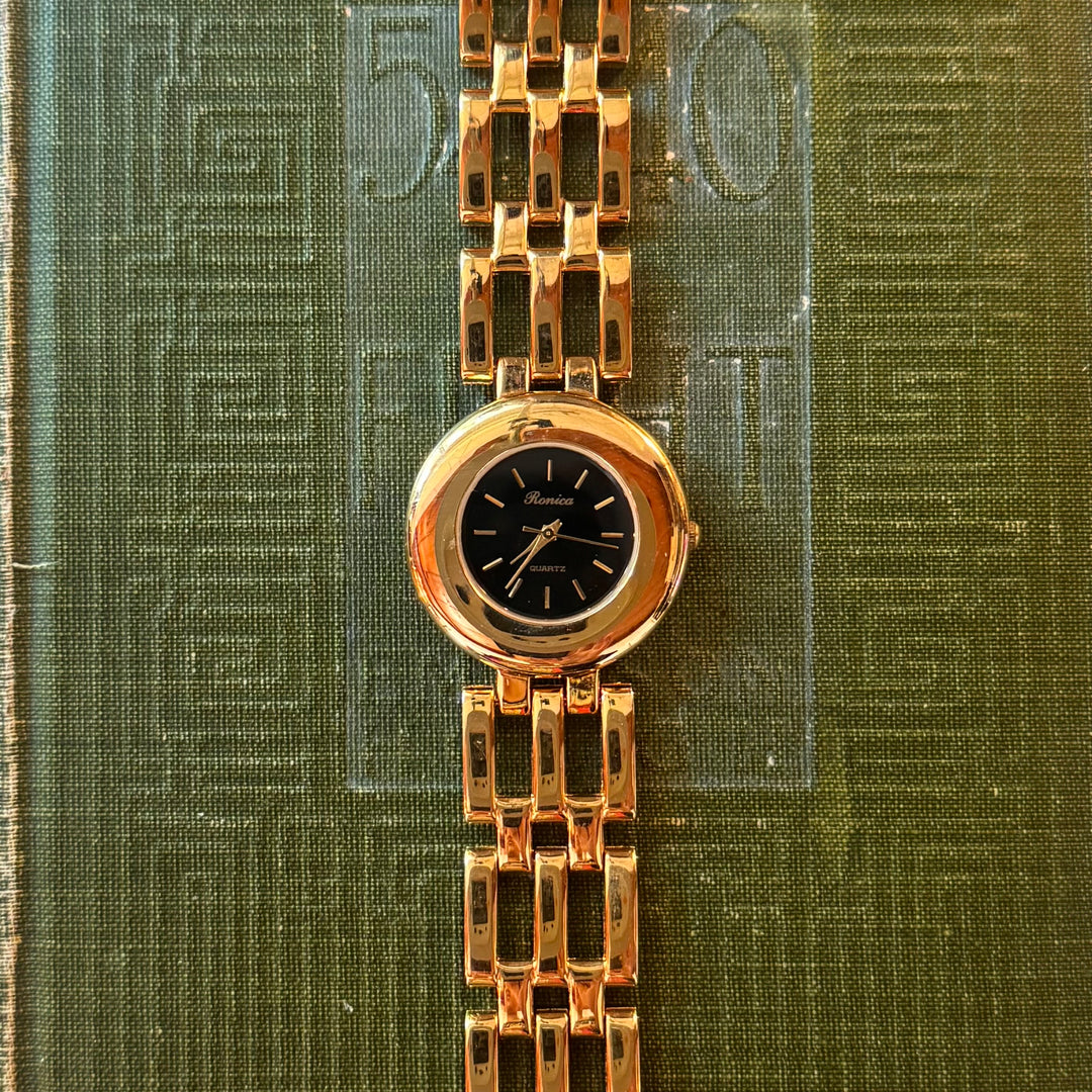 Gold Watch with Black Face