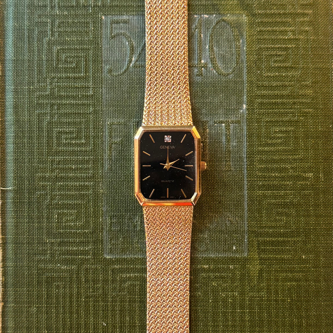 Gold Watch with Black Face