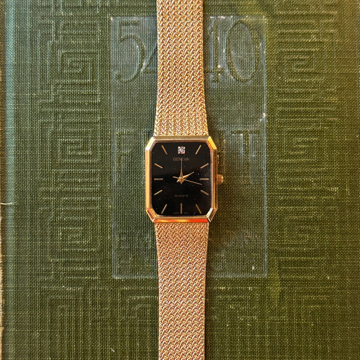 Gold Watch with Black Face