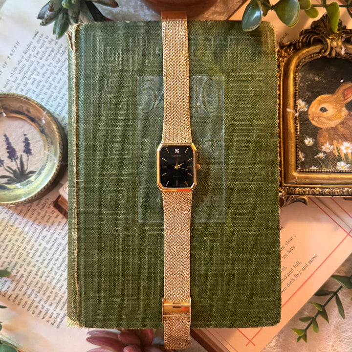 Gold Watch with Black Face