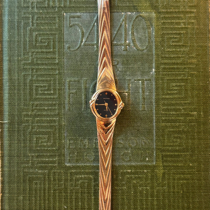 Gold Watch with Black Face