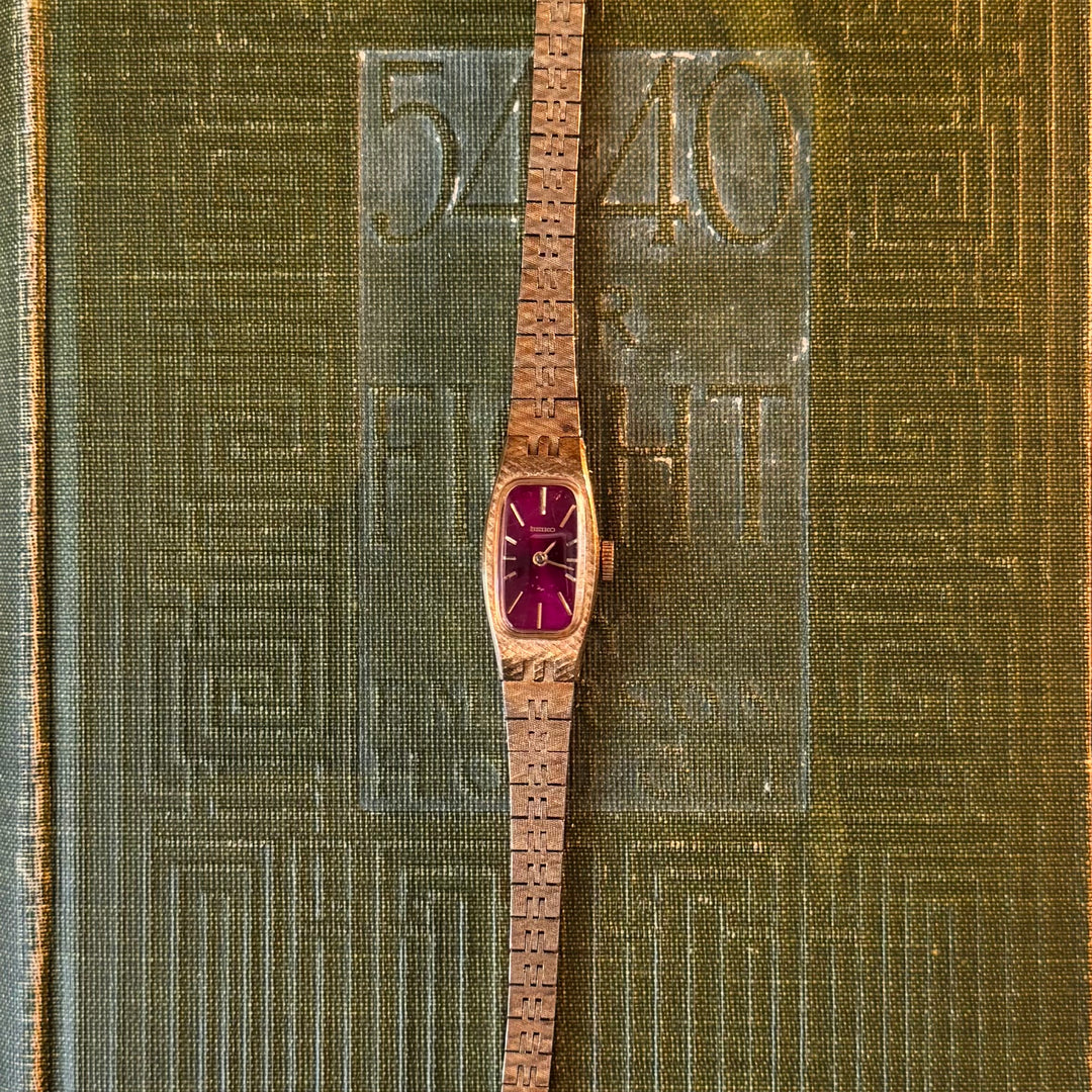 Gold Seiko Watch with Red Face