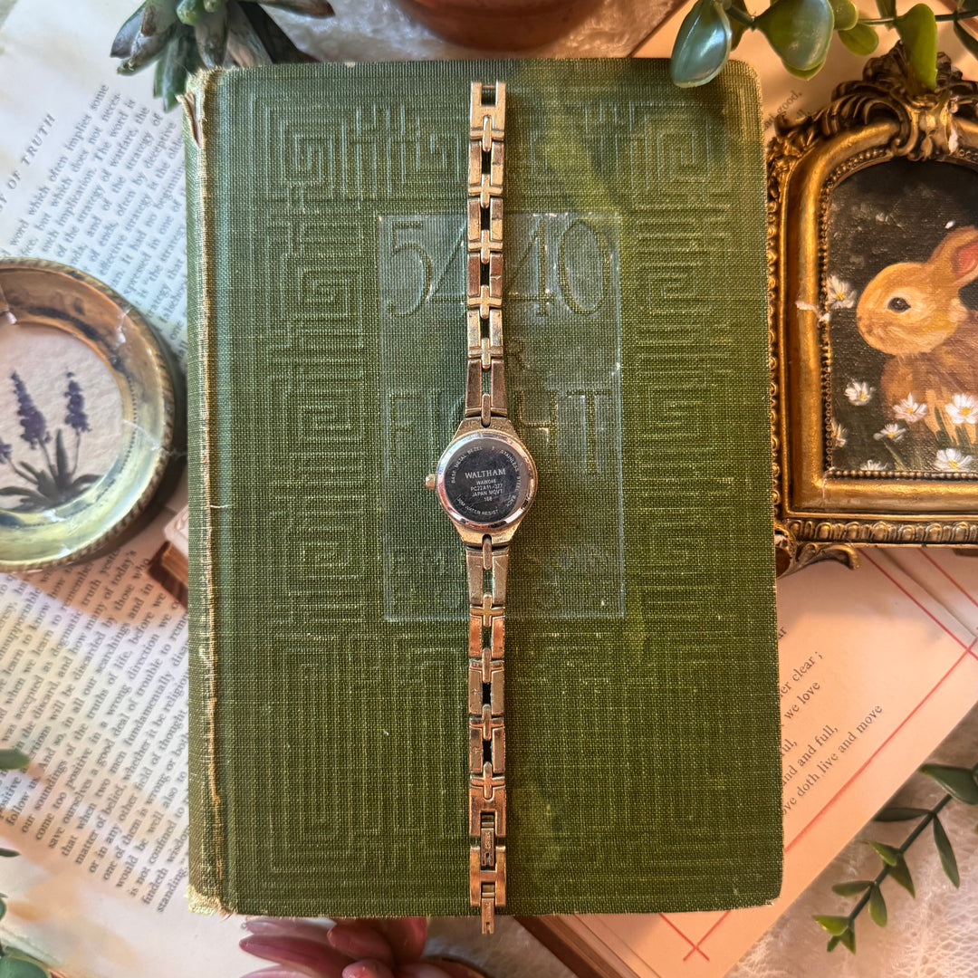 Gold Watch with Black Face