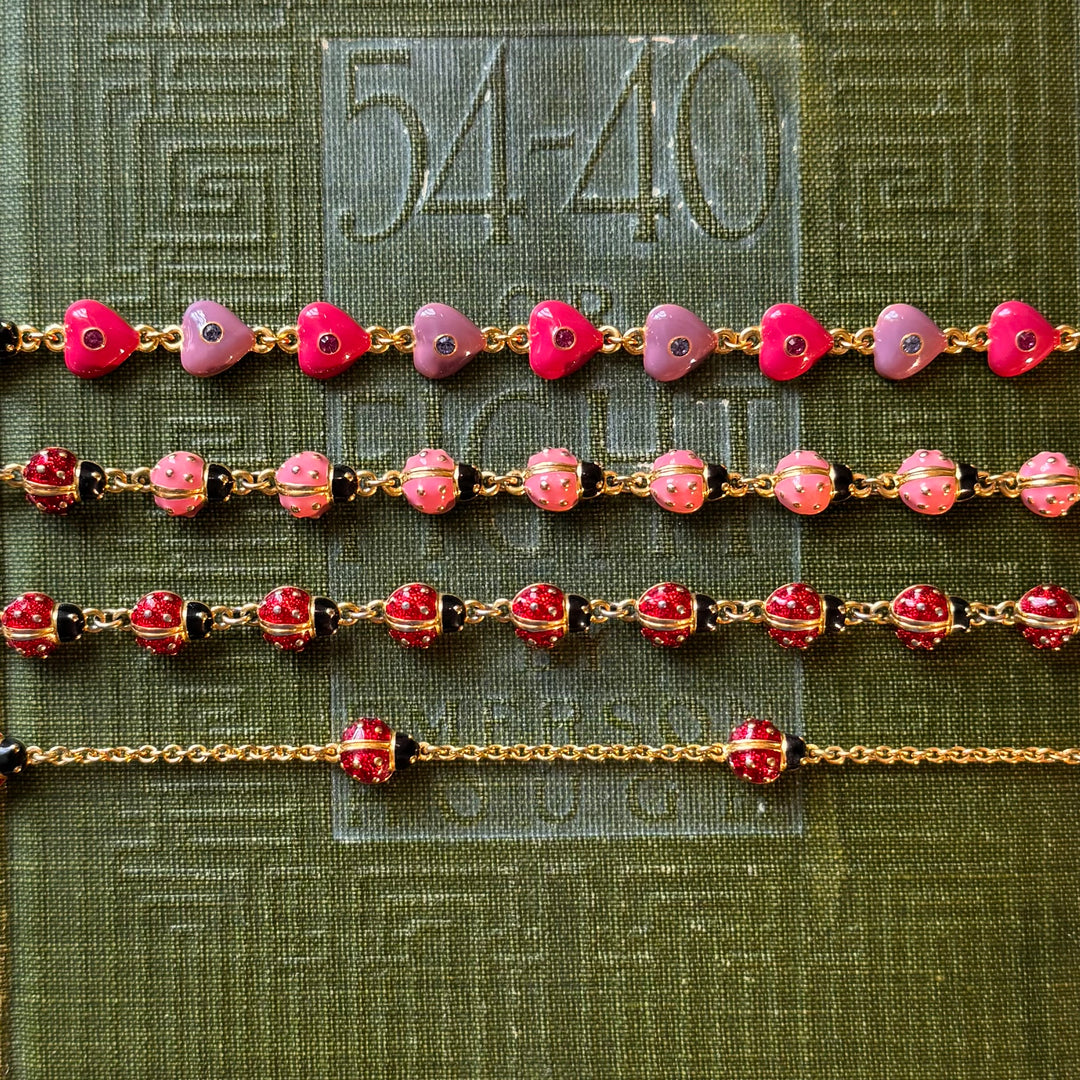 Gold Enamel Joan Rivers Bracelets