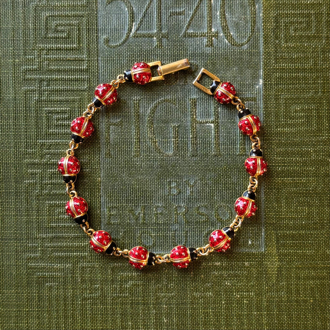 Gold Enamel Joan Rivers Bracelets