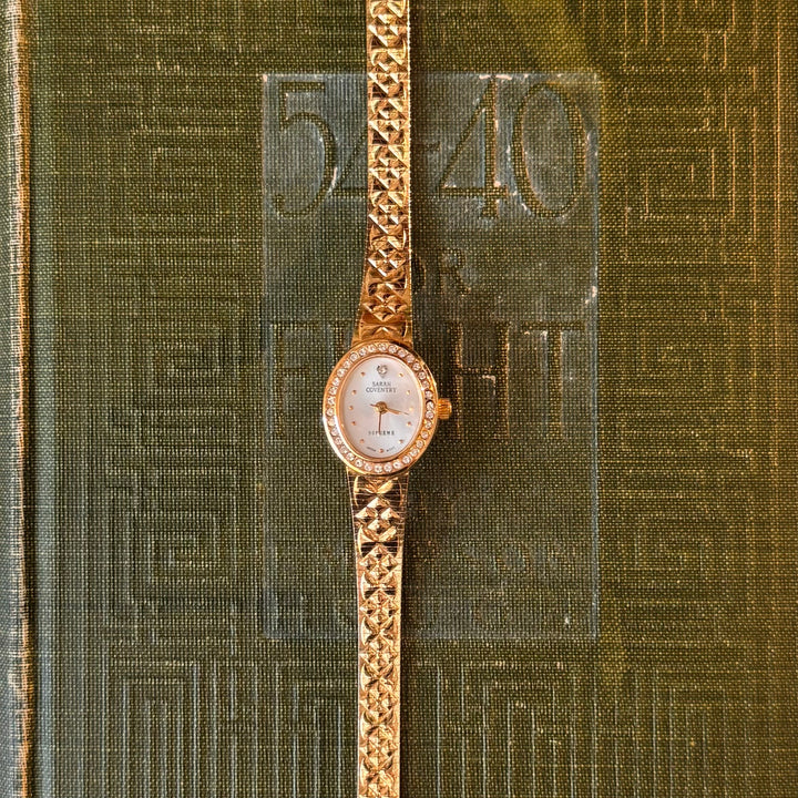 Gold Bow Watch