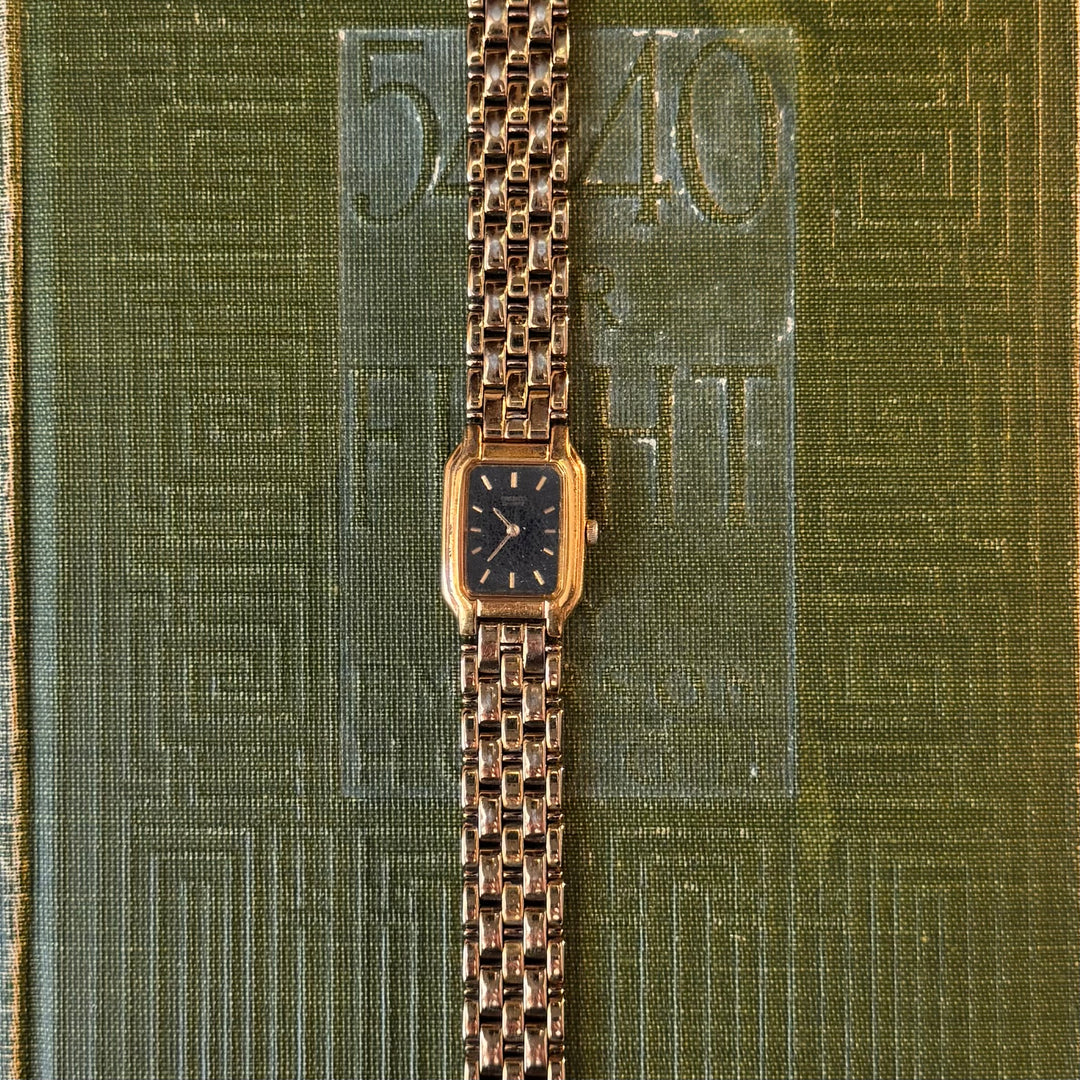 Gold Watch with Black Face