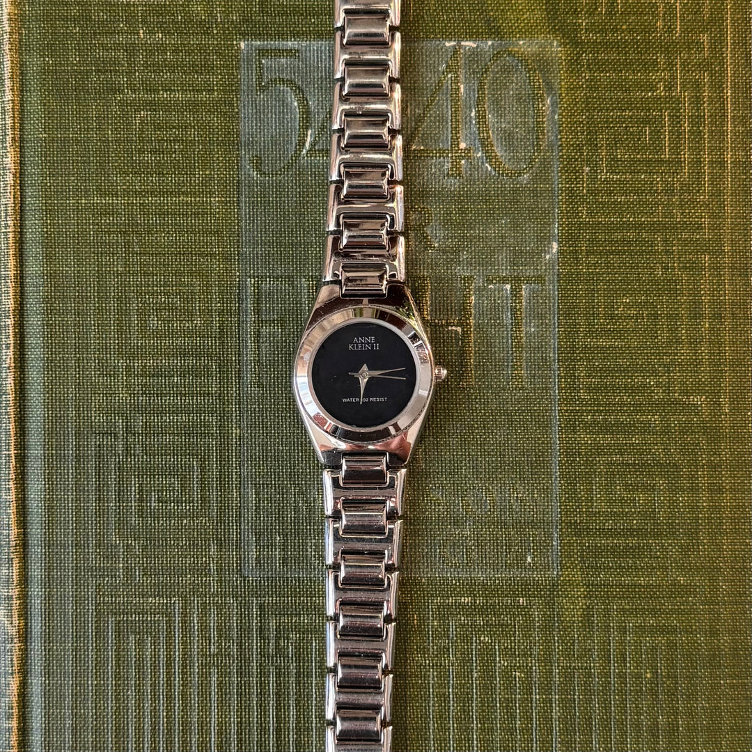 Silver Watch with Black Face