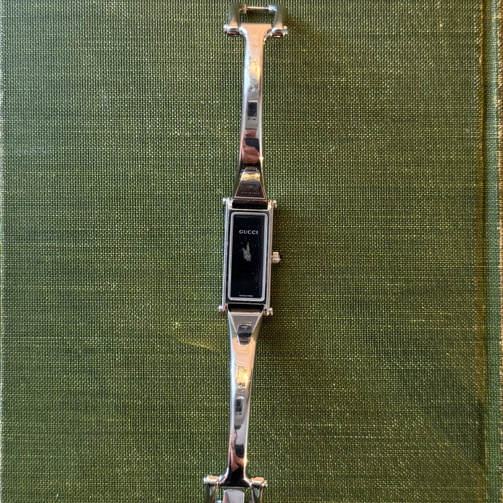 Silver Gucci Watch with Black Face