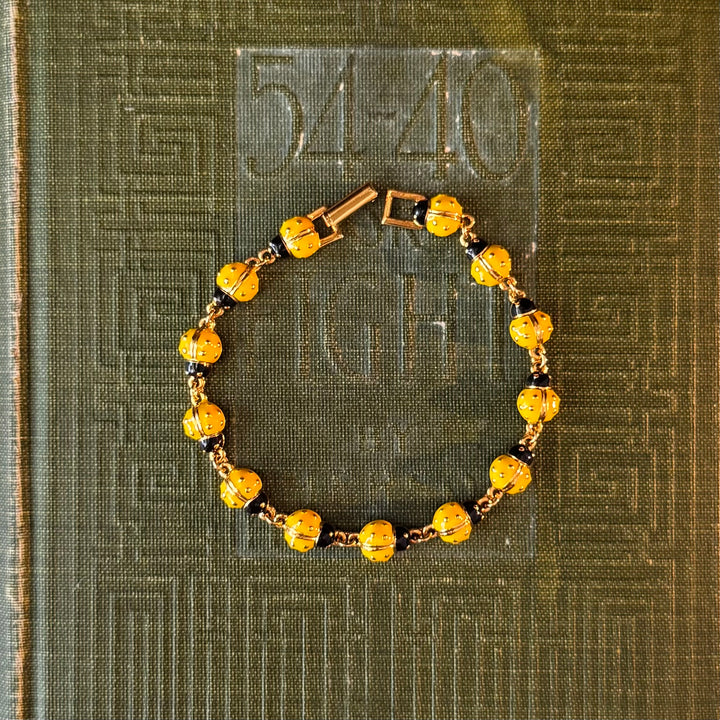 Gold Enamel Joan Rivers Bracelets