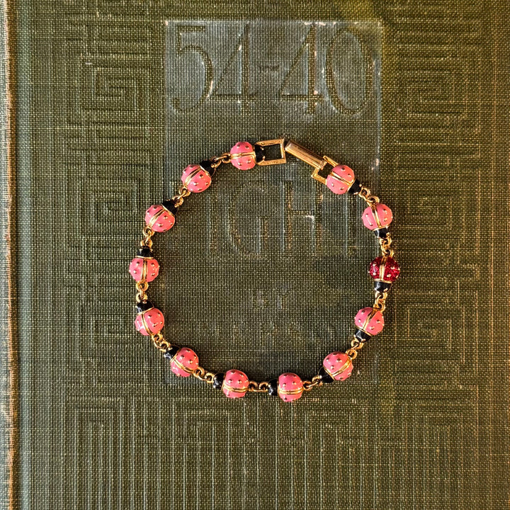 Gold Enamel Joan Rivers Bracelets